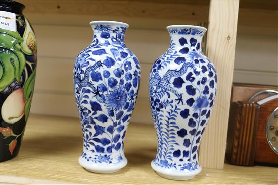 A pair of Chinese blue and white vases 23cm.